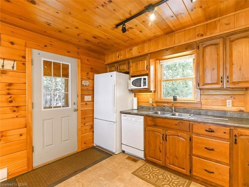 Kitchen — entry and fridge